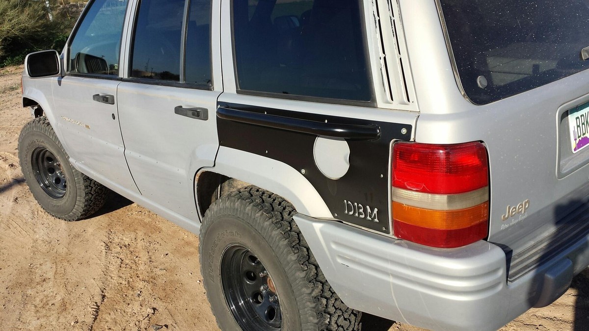 Jeep Grand Cherokee ZJ Rear Quarter Panel Armor with Rubrail | USA