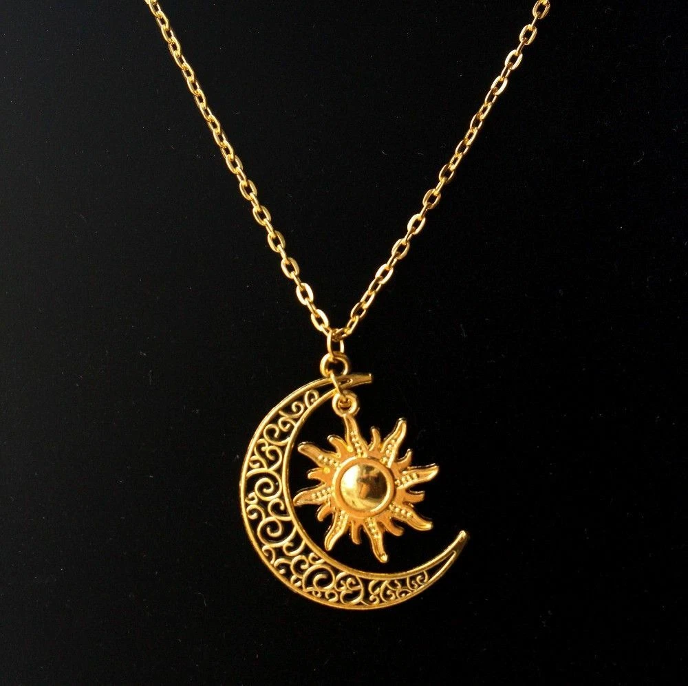 Gold necklace with store sun pendant
