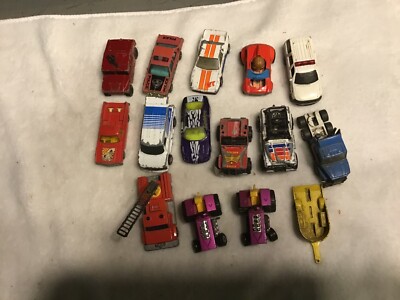 15 matchbox cars,tractors ,trucks ,vans ,m/cycle trailer, jeep fire truck
