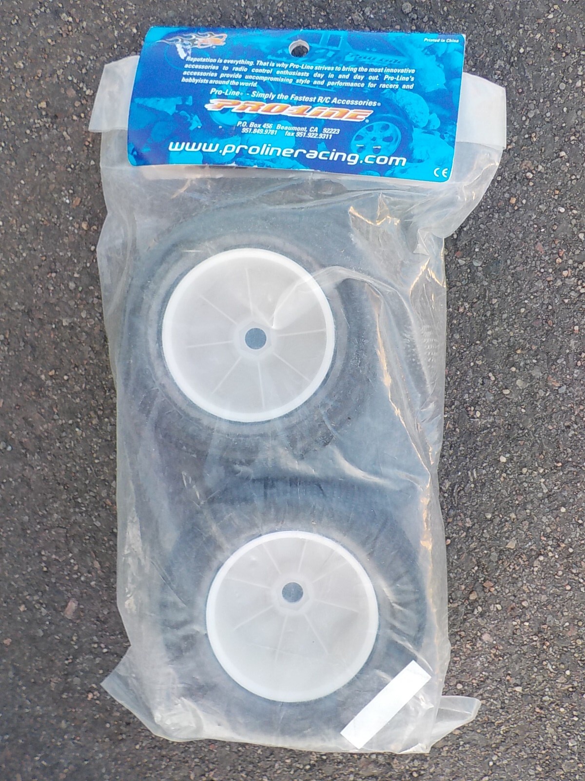 Pro-Line Holeshot MTR M2 Tires Mounted on 17mm White Velocity Wheels Truggy Revo