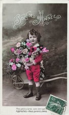 CP BONNE ANNEE ENFANT AVEC FLEURS DEVANT BROUETTE - 30269