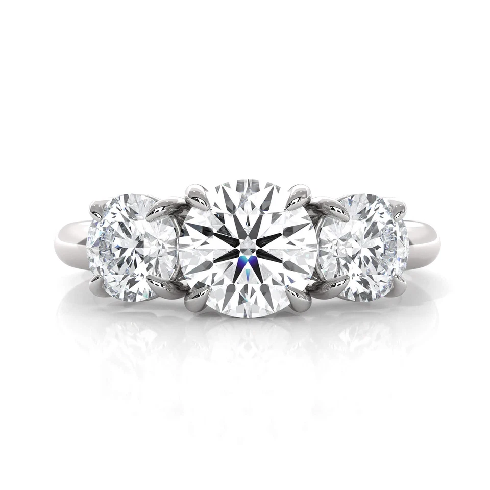 Anillo de compromiso de diamantes de corte redondo con montura de puntas de canasta de 3 piedras GIA E SI1 3,46 quilates Foto 2 de 4