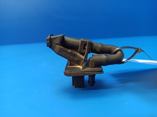 Rear window washer spray nozzle