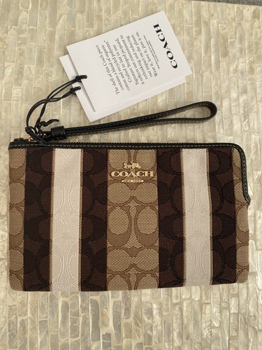 coach jacquard wristlet