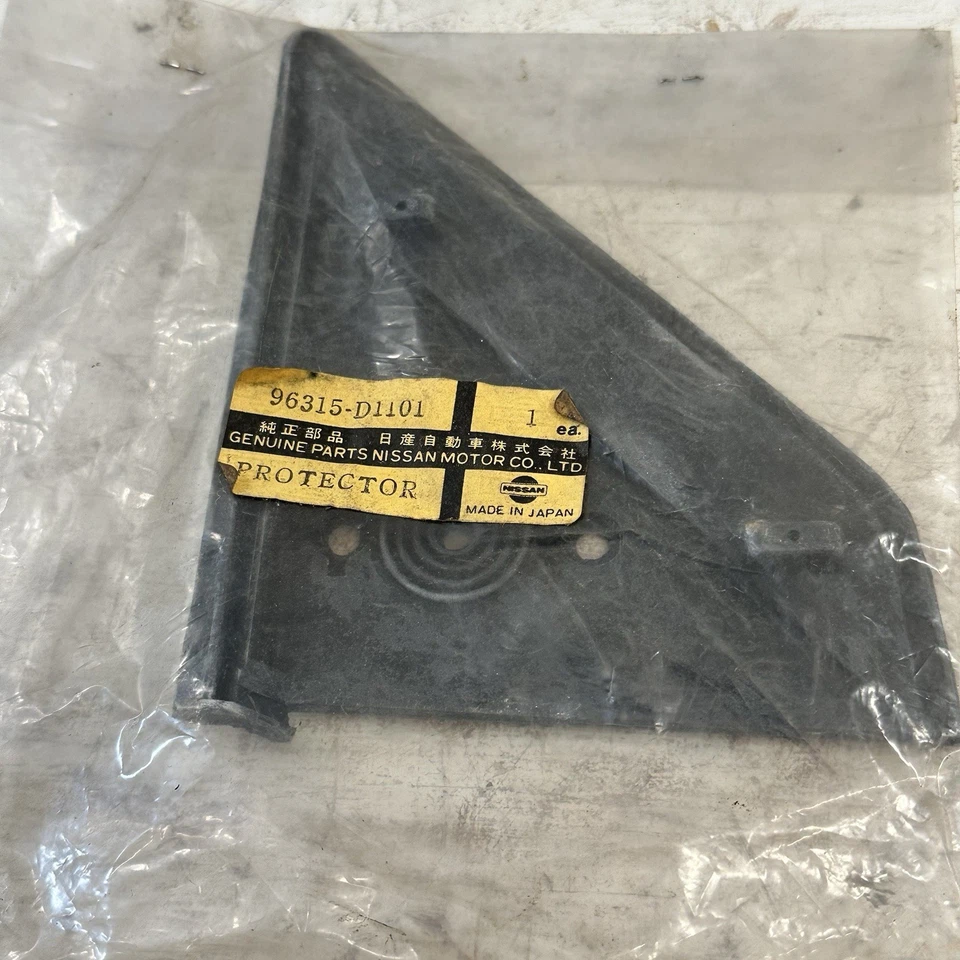 Nueva aleta de acabado de esquina de puerta LH Nissan 96315D1101 de colección OEM para 350Z NOS Foto 4 de 4
