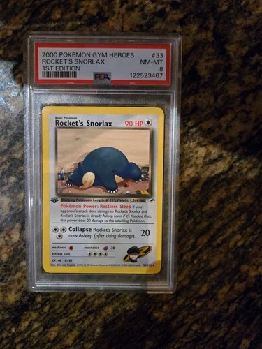 Rocket's Snorlax 033/132 1st edition PSA 8 Gym Heroes