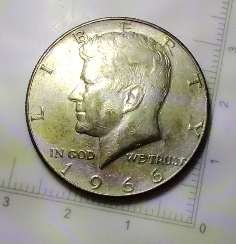 1966 KENNEDY HALF DOLLAR 40% SILVER RAINBOW AT THE EDGE. 6640
