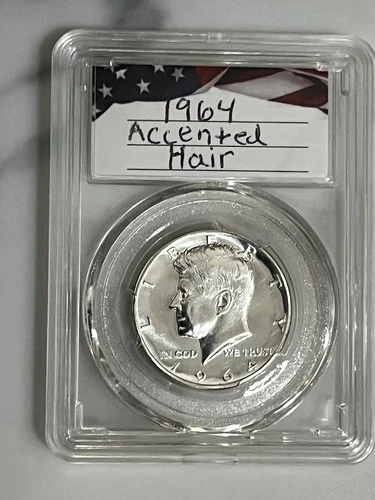 1964 silver JFK half dollar proof. Accented hair.