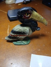 VINTAGE CAST IRON PELICAN CAST IRON BOTTLE OP...