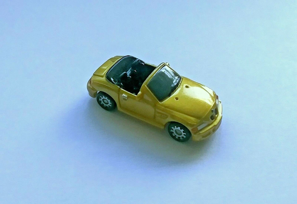 Coche deportivo convertible BMW Z-3 Roadster tamaño micro Hot Wheels, versión dorada. Foto 3 de 4
