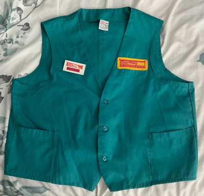 Child World toy store employee vest with name tag
