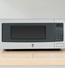 GE Profile 1.1 Cu. Horno microondas encimera 800 vatios PEM31SF4SS - *abolladura*