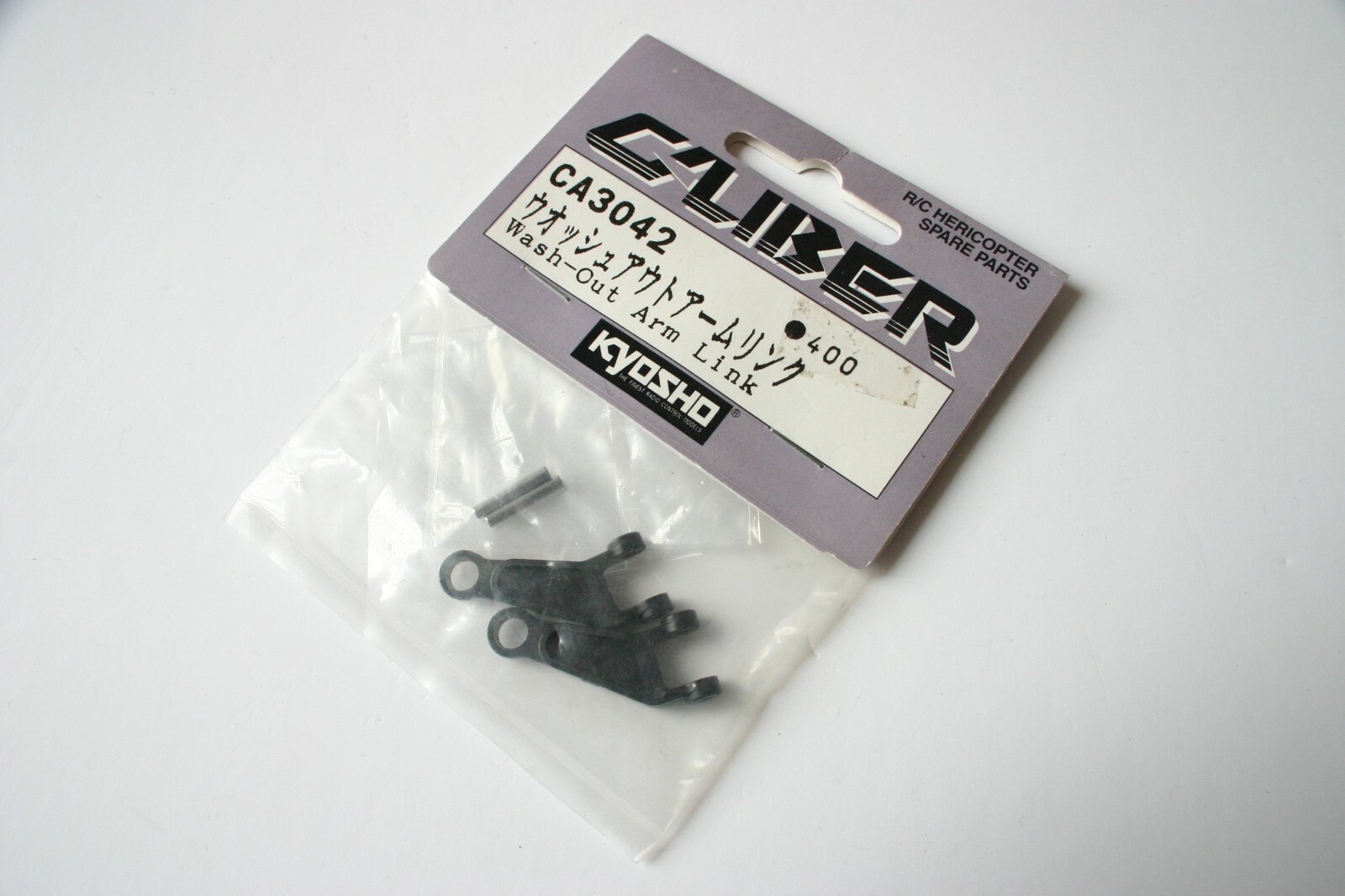 Kyosho Caliber 30 Wash-Out Arm Link - CA3042