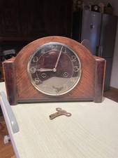 HAC, German Mantel clock. Working well. Nice case and complete with key and bob