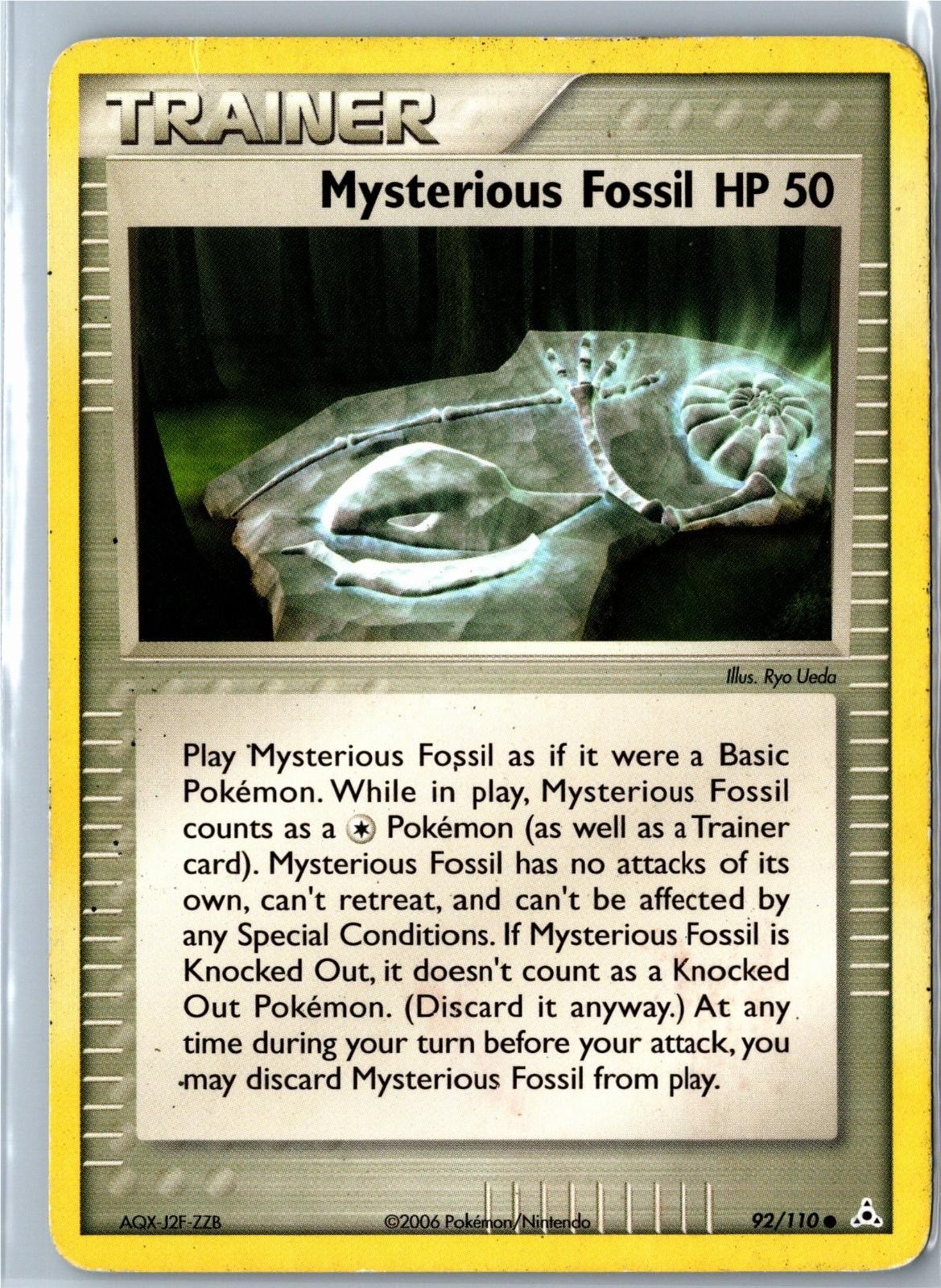 Mysterious Fossil - 92/110 - Holon Phantoms - Common - Damaged
