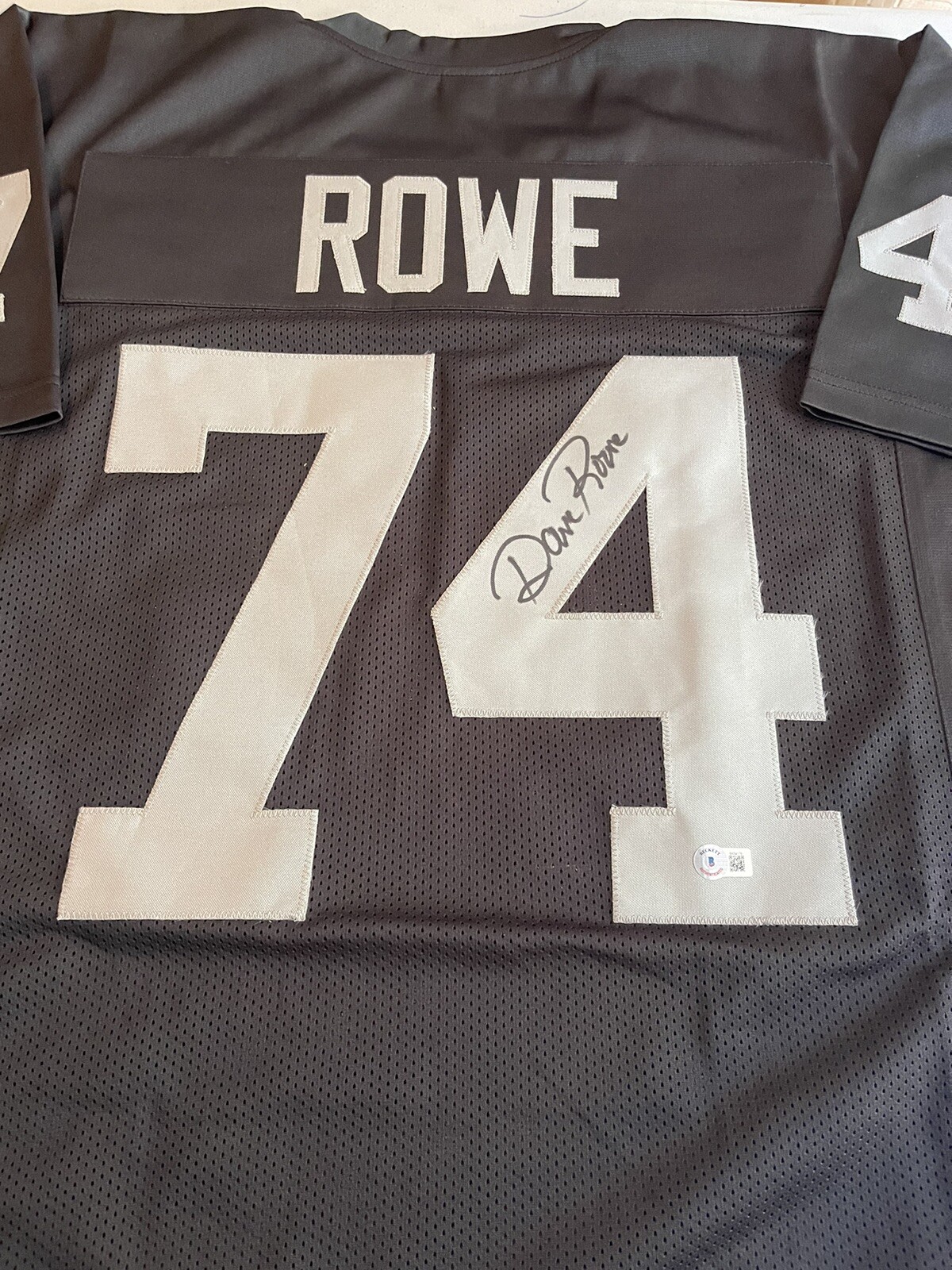 FILA MAGLIA CASA CUCITA FIRMATA OAKLAND RAIDERS DAVE ROWE #74 Super Bowl XI Beckett
