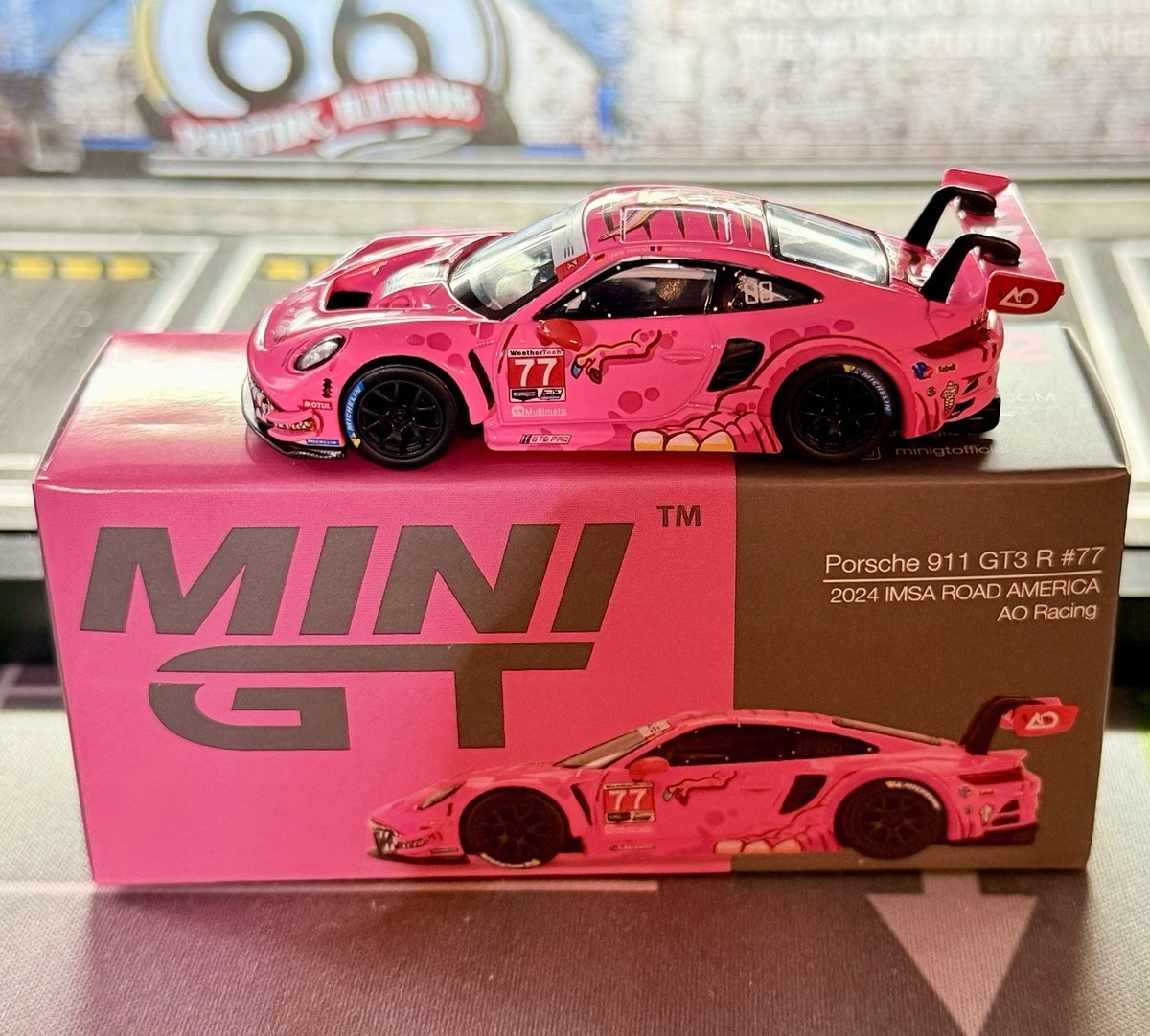 Mini GT Porsche 911 GT3 R #77 AO Racing ROXY 2024 IMSA Road