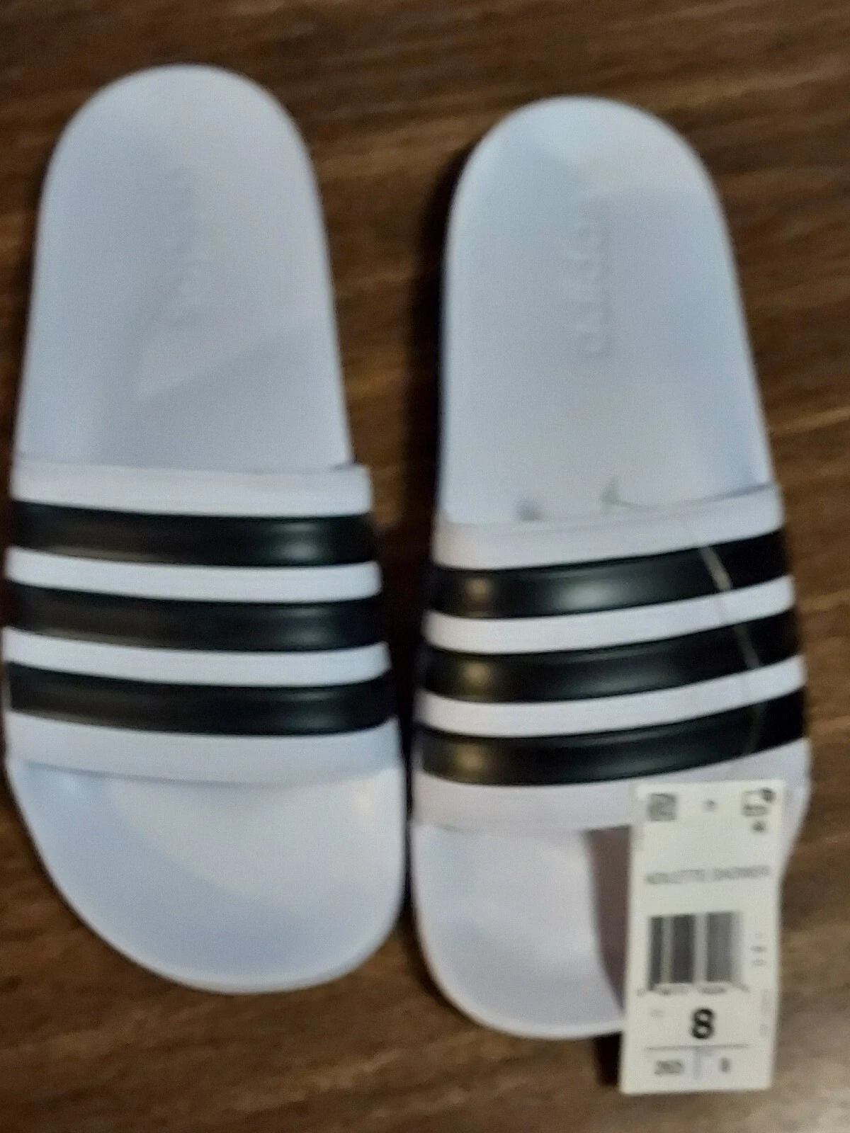 Scarpe slip on Adidas Adilette Shower Slides Collegiate nere con bianche da uomo taglia 8