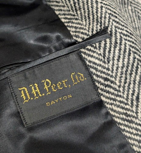 Gray wool vintage TWEED donegal coat with black satin label reading “D.A. Peer, Ltd., Dayton” in gold lettering.