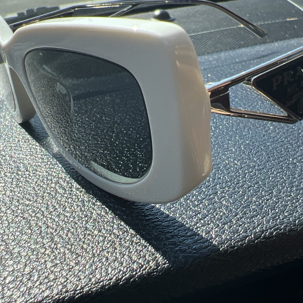 Prada Sunglasses SPR14Y 142-5S0 White Silver Square Frames with Dark Gray Lenses Prada - PR 14YS Sunglasses | Specs Collective main image 3