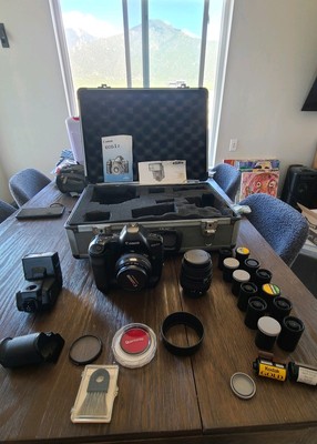 EOS-1N 35mm single lens reflex (SLR) W/ PB-E1 plus Free Lense Case big Package!