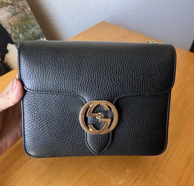 Gucci black leather crossbody bag with adjustable shoulder strap