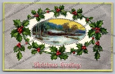 Antique Postcard 1909 embossed Christmas Greetings holly-framed scene