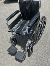 Wheelchair With Swing away Footrests