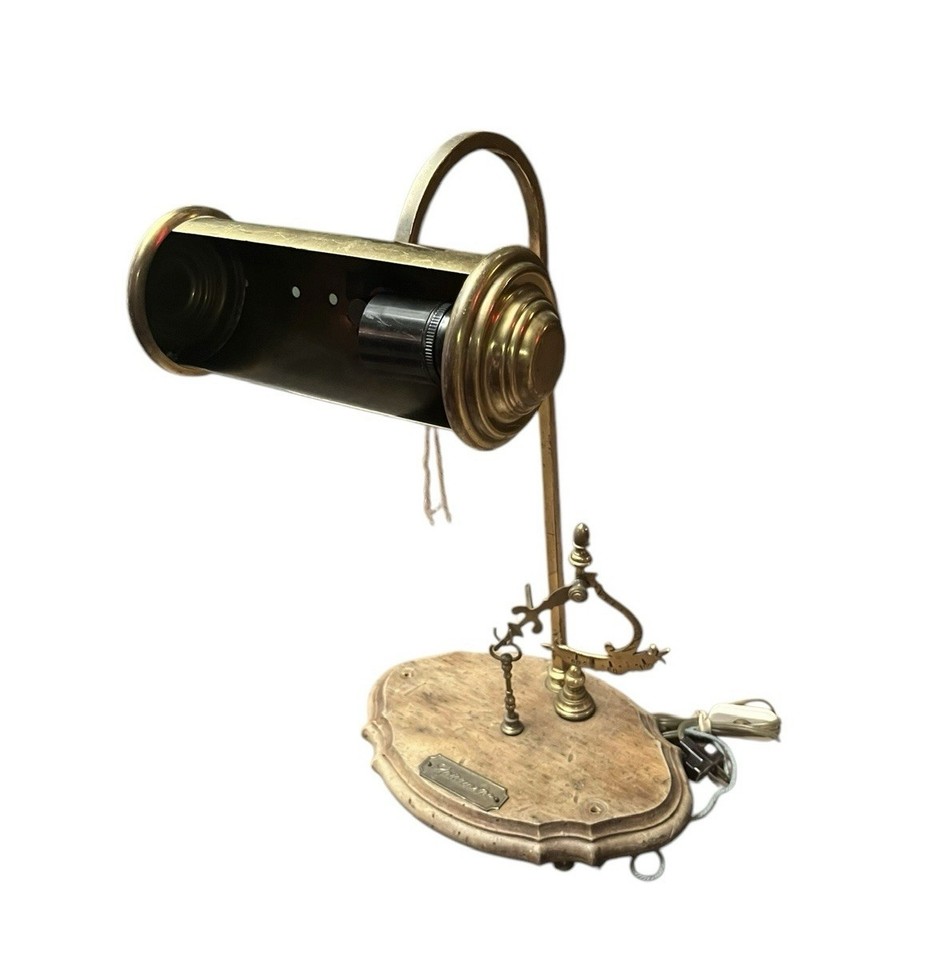 An Italian brass 'Spettrometro' optical spectrometer — a breathtakingly beautiful precision scientific instrument that looks like it belongs in a Renaissance scholar's study.