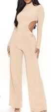 TAN FLARE LEG JUMPSUIT WITH SIDE CUT OUT