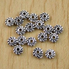100pcs Tibetan Silver Gyrate Beads H0511