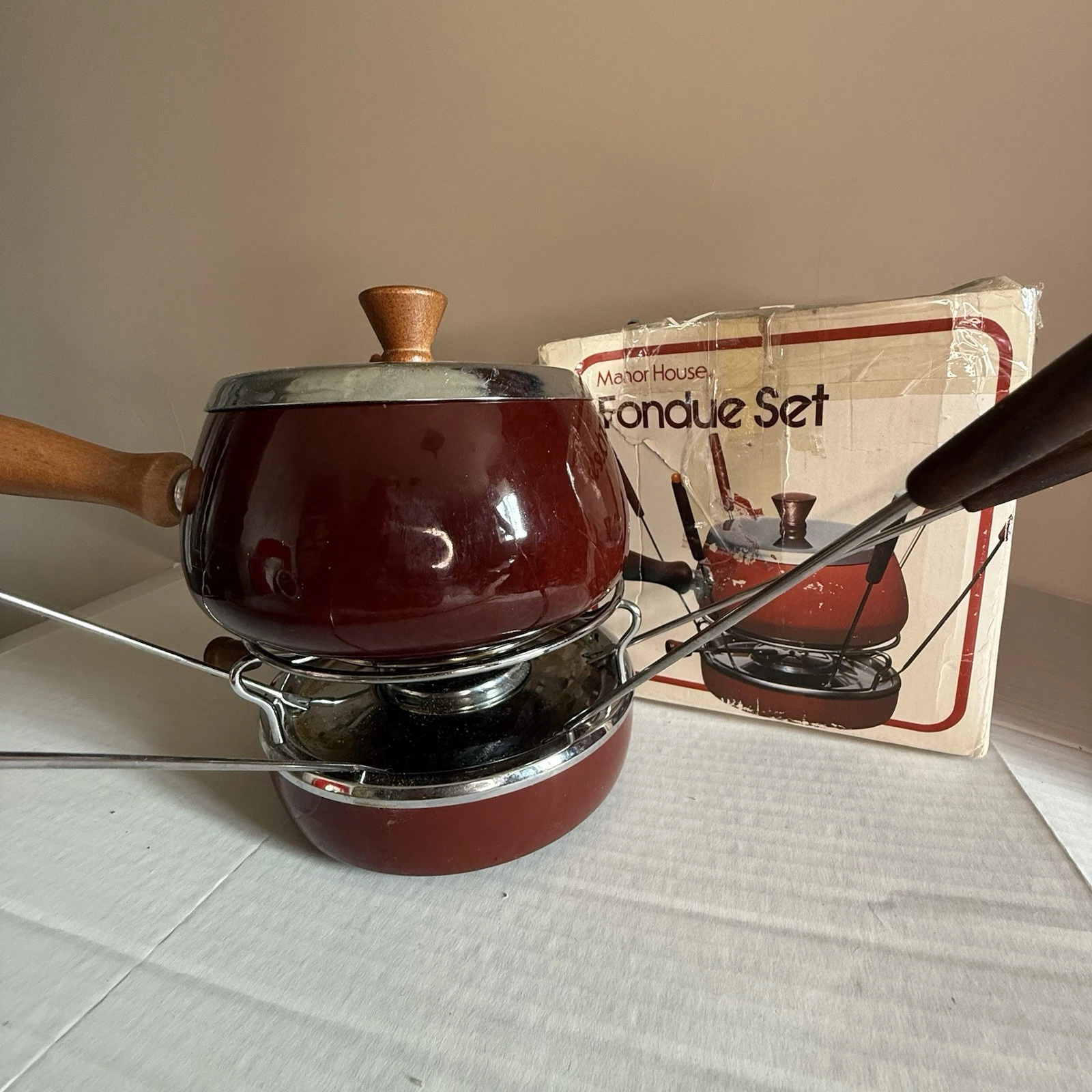 Brown Enamel Fondue Pot with Wood Handles Stand Burner and Forks Vintage
Opens in a new window or ta