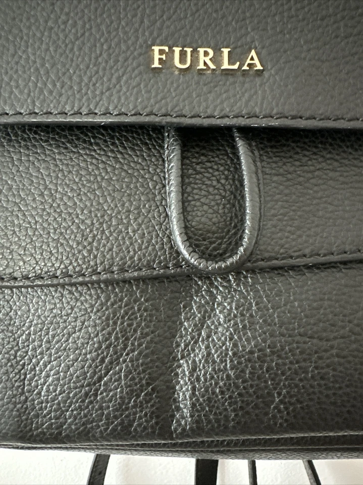 Mochila de cuero Furla pequeña negra genuina hecha en Italia EXL usada Foto 2 de 4