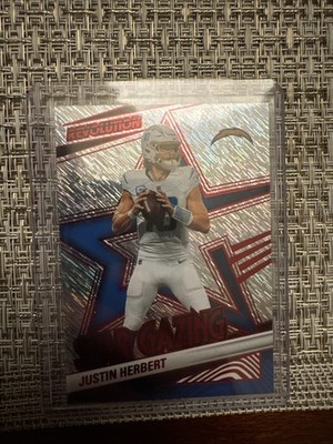 2025 Panini Revolution Star Gazing Justin Herbert #2 Red Cosmo /50