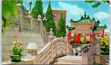 Postcard - An imposing bridge leading to a pavilion in Tiger Balm Garden - China