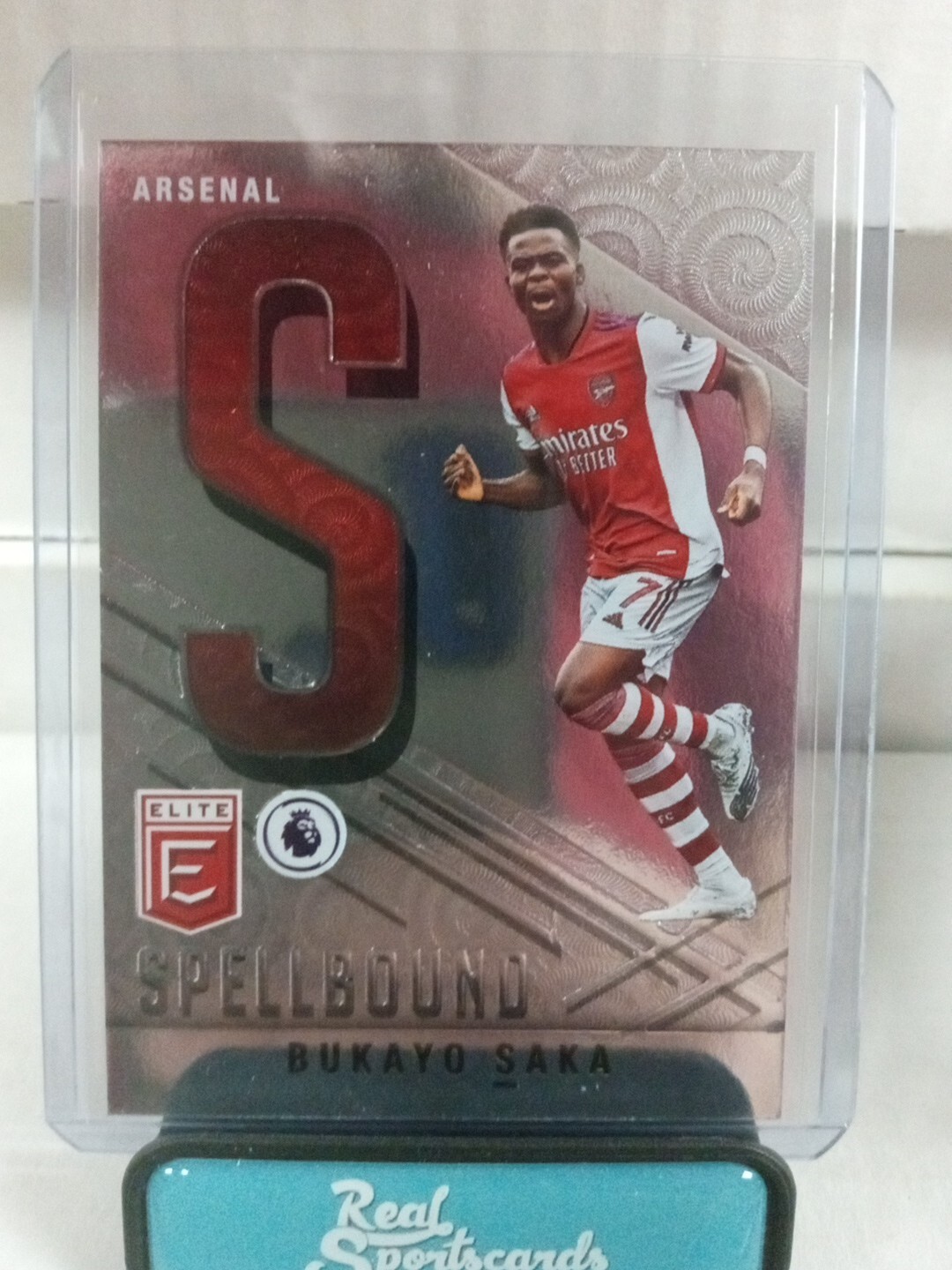 2021-22 Panini Donruss Elite Premier League Spellbound Bukayo Saka #1 