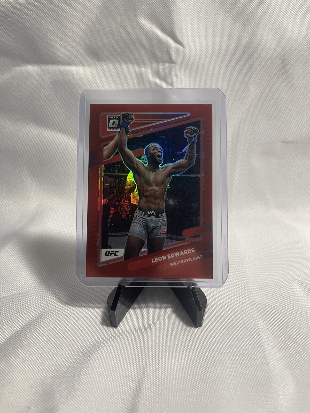 2022 UFC Donruss Optic Leon Edwards # 62 Red Prizm Parallel /199