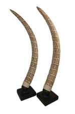 AMNH Museum Faux Elephant Tusk Sculptures 42" Long (Pair) AMNH Museum Faux Elephant Tusk Sculptures 42" Long (Pair)