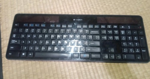 Logitech K750 Wireless Solar Keyboard with reciever and battery charges/works.