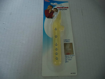 One Yellow Ezy Dose Two Teaspoon Medicine Spoon