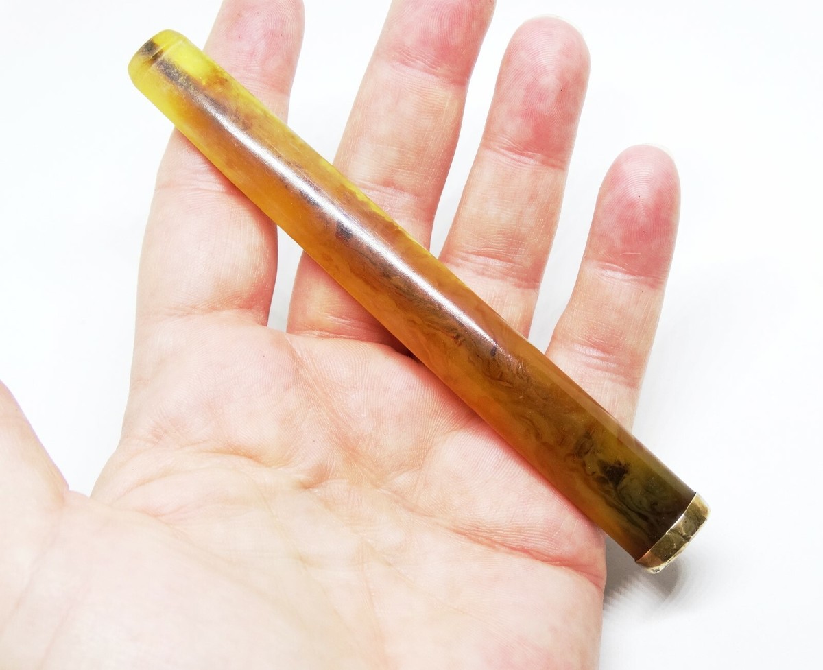 art deco cigarette holder Sapphire and Diamond Case in 18K The Vintage Flapper Cigarette Holder will have you looking like the real deal straight from the 20s Vintage Globe Cigarette Dispenser &