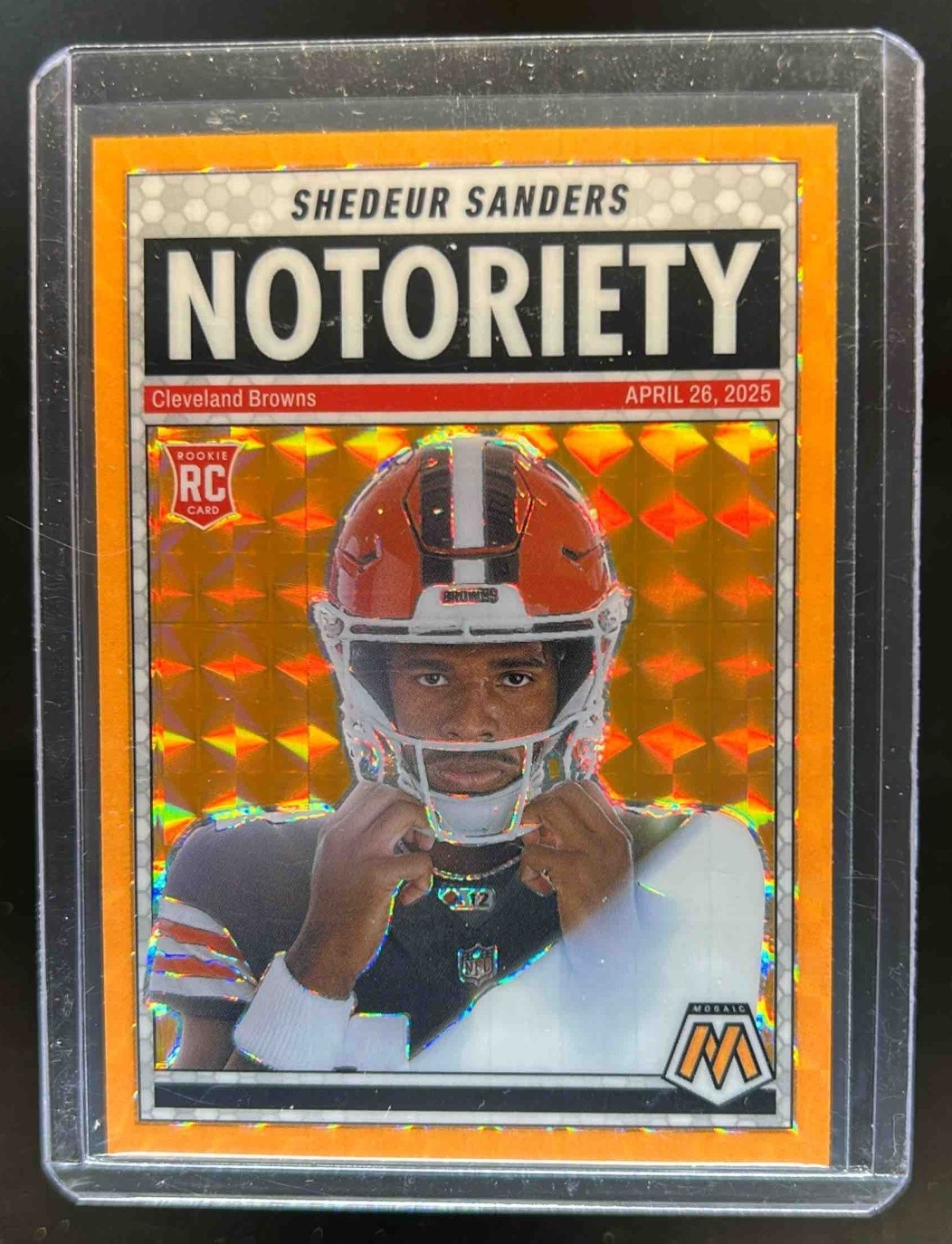 2025 Mosaic Shedeur Sanders Notoriety RC Orange Fluorescent Prizm #13 Browns