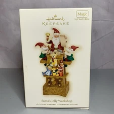 Hallmark 2011  Santa’s Jolly Workshop Christmas ornament Magic Light