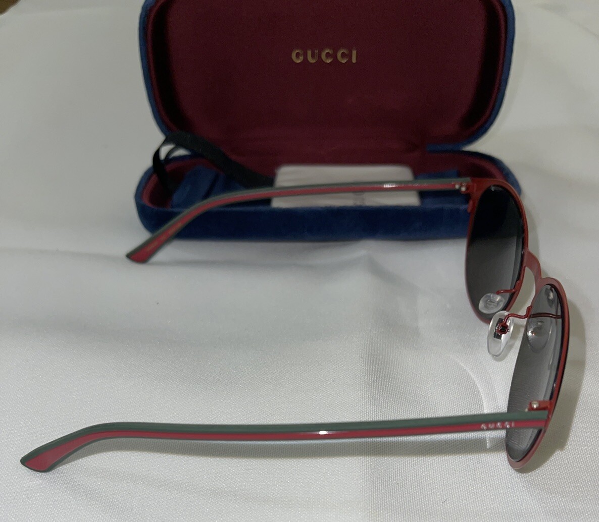 Gucci sunglasses in red with multi-colored lenses, limited edition
