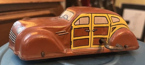 VINTAGE J. CHEIN MADE IN USA TIN WIND-UP TOY CAR - WOODY