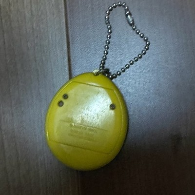 Rare Bandai Mori de Hakken Tamagotchi Found in the forest yellow