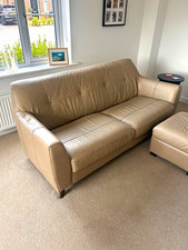 DFS 3-seater leather sofa. Single chair and foot stool