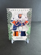 2025-26 UD ARTIFACTS EMERALD MATERIAL #68 Noah Dobson ISLANDERS 48/65 EX/NM