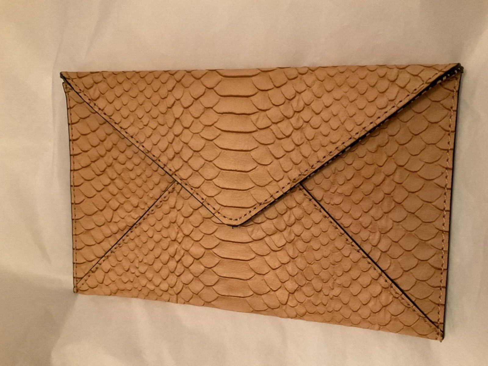 EXCELLENT CONDITION Loeffler Randall Python Embos… - image 1