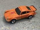 GoBots Puzzler Crossword 1984 Bandai Orange Porsche Vintage Car